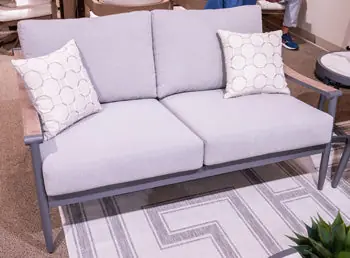 Ocean Beach Outdoor Loveseat with Cushion - Ashley Furniture