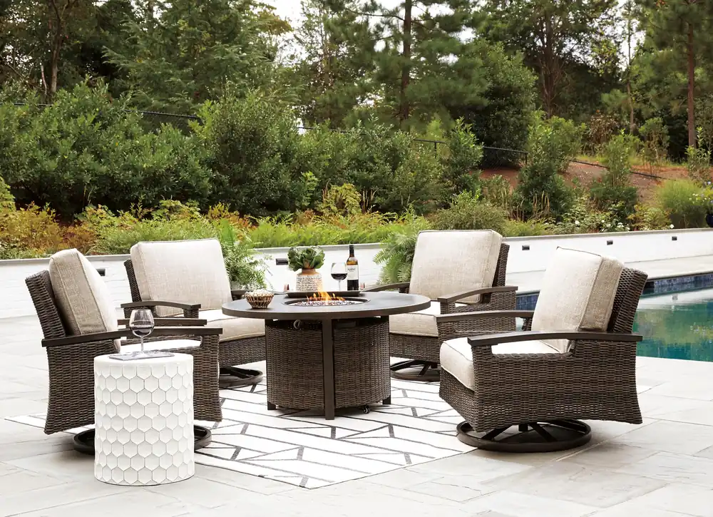 Paradise Trail Paradise Trail Fire Pit Table with 4 Nuvella Swivel Lounge Chairs - Ashley Furniture