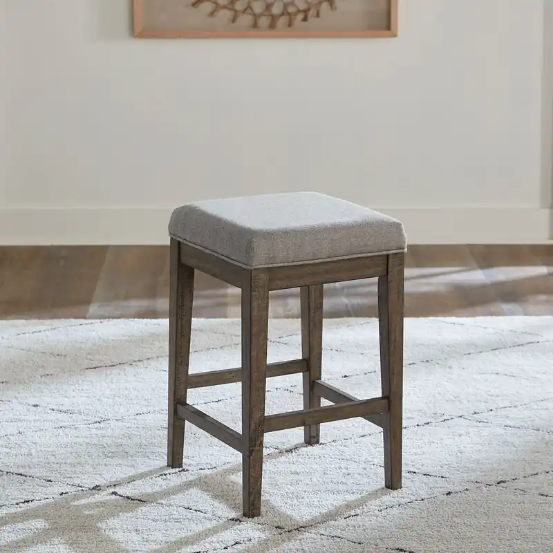 Arrowcreek Upholstered Console Stool in Weathered Stone - Liberty