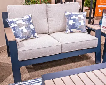 East Beach Outdoor Loveseat with Cushion - Ashley Furniture